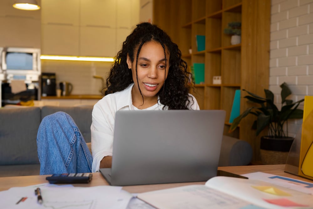 Focused Woman Working on Laptop