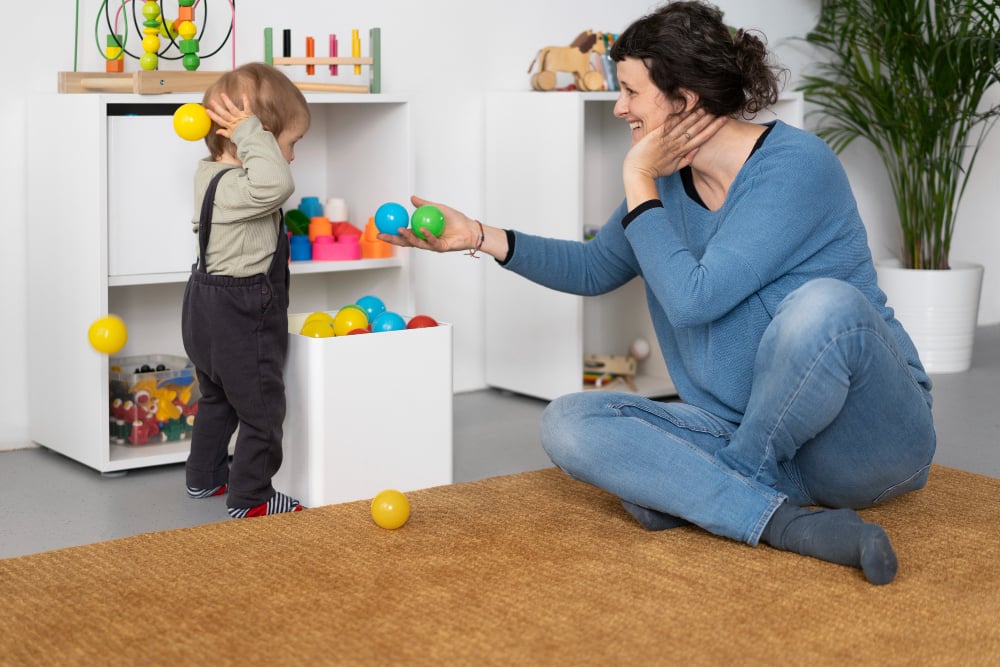 Joyful Playtime Between Mother And Child