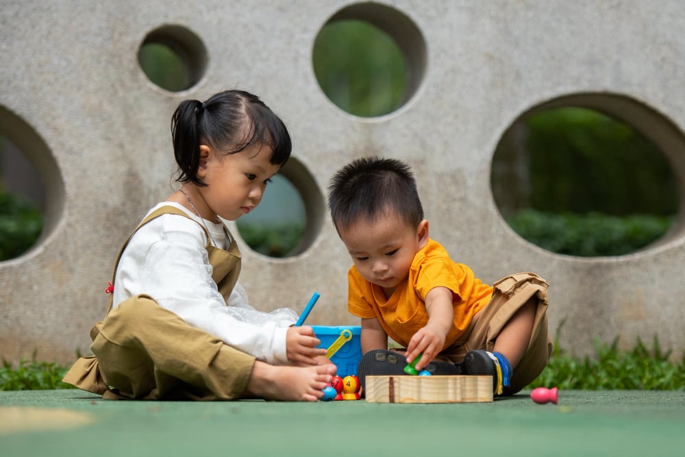Two Children Engaged in Playtime Activities